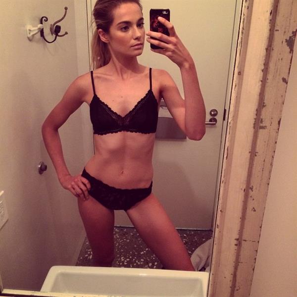 Bridget Malcolm in lingerie taking a selfie