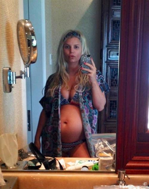 Jessica Simpson in a bikini taking a selfie