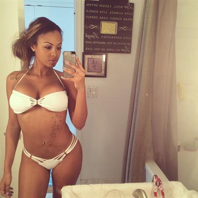 Ana Montana in a bikini taking a selfie