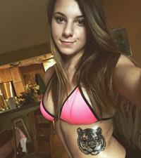Anonymous in a bikini taking a selfie