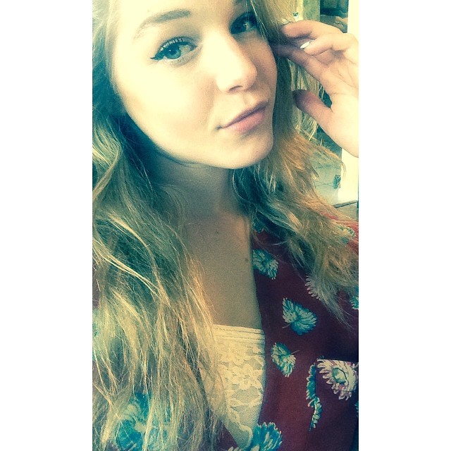 Courtney Tailor taking a selfie