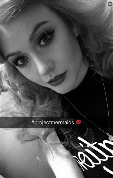 Katherine McNamara taking a selfie