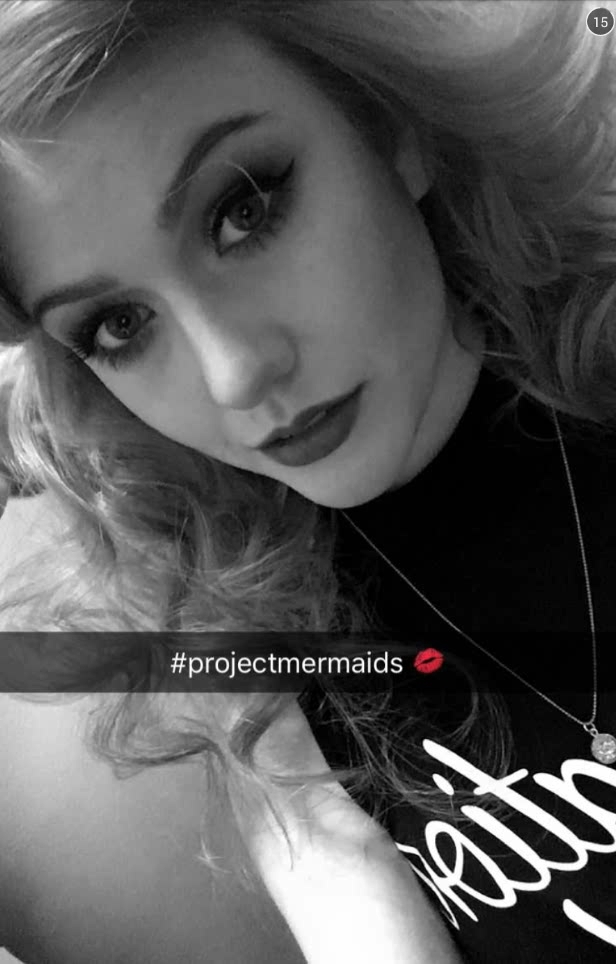 Katherine McNamara taking a selfie