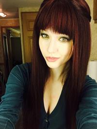 Katherine McNamara taking a selfie