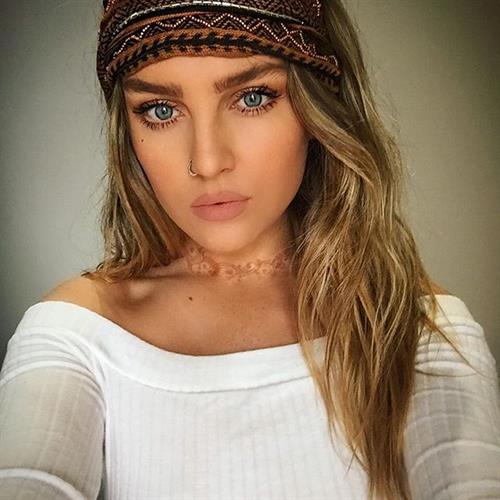 Perrie Edwards taking a selfie