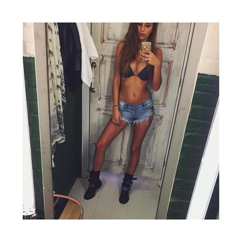 Paulina Mikolajczak in a bikini taking a selfie