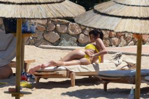 Aida Yespica - Yellow bikini candids in Sardinia on June 18, 2012