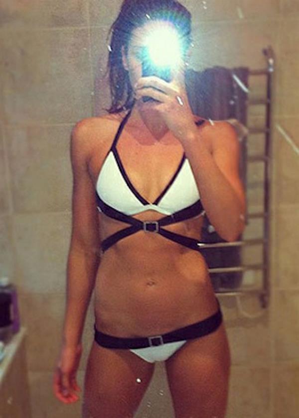 Stephanie Rice in a bikini taking a selfie