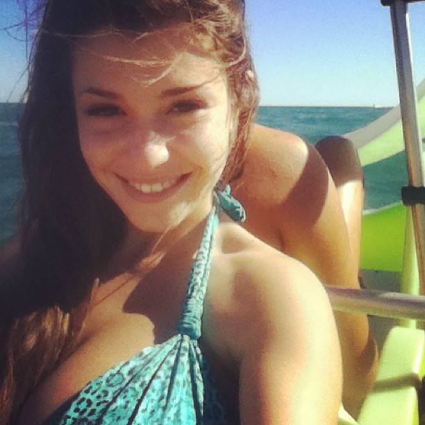 Carolina Neto in a bikini taking a selfie