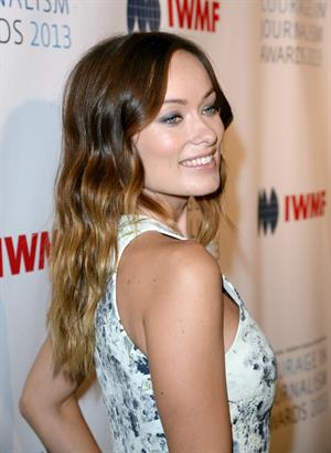 Olivia Wilde debuts her small baby bump while attending the 2013 International Women’s Media Foundation’s Courage in Journalism Awards at the Beverly Hills Hotel on Tuesday (October 29, 2013) in Beverly Hills, Calif.