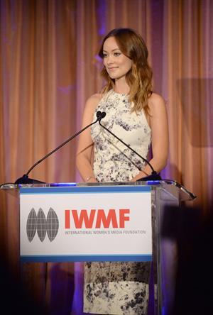 Olivia Wilde debuts her small baby bump while attending the 2013 International Women’s Media Foundation’s Courage in Journalism Awards at the Beverly Hills Hotel on Tuesday (October 29, 2013) in Beverly Hills, Calif.
