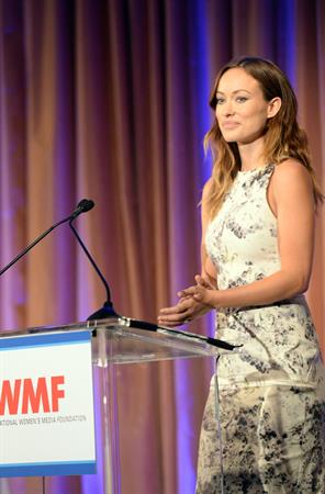 Olivia Wilde debuts her small baby bump while attending the 2013 International Women’s Media Foundation’s Courage in Journalism Awards at the Beverly Hills Hotel on Tuesday (October 29, 2013) in Beverly Hills, Calif.
