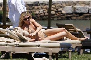 Abigail Clancy bikini candids in Italy on June 11, 2011