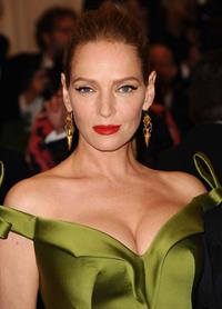 Uma Thurman in a green dress