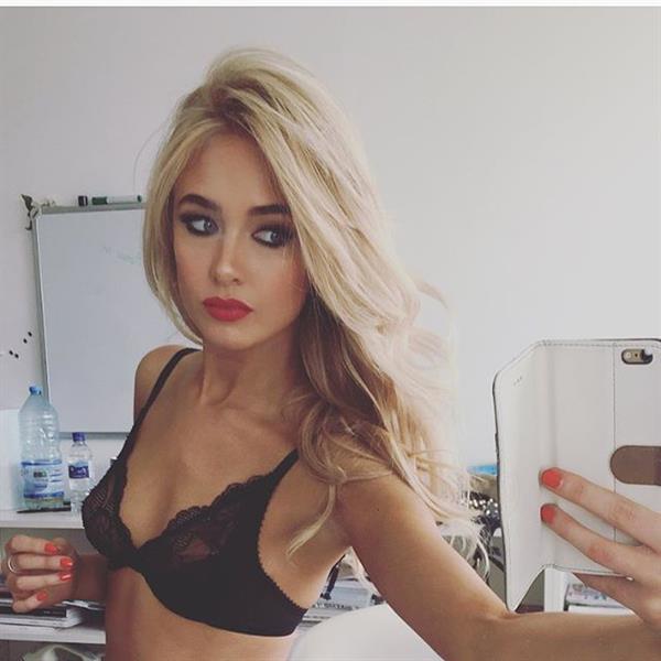 Nicola Hughes in lingerie taking a selfie