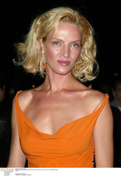 Uma Thurman in an orange dress