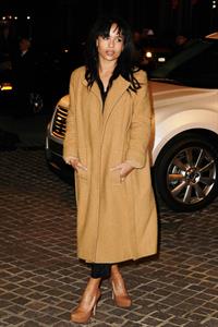 Zoe Kravitz in a long jacket and high heels