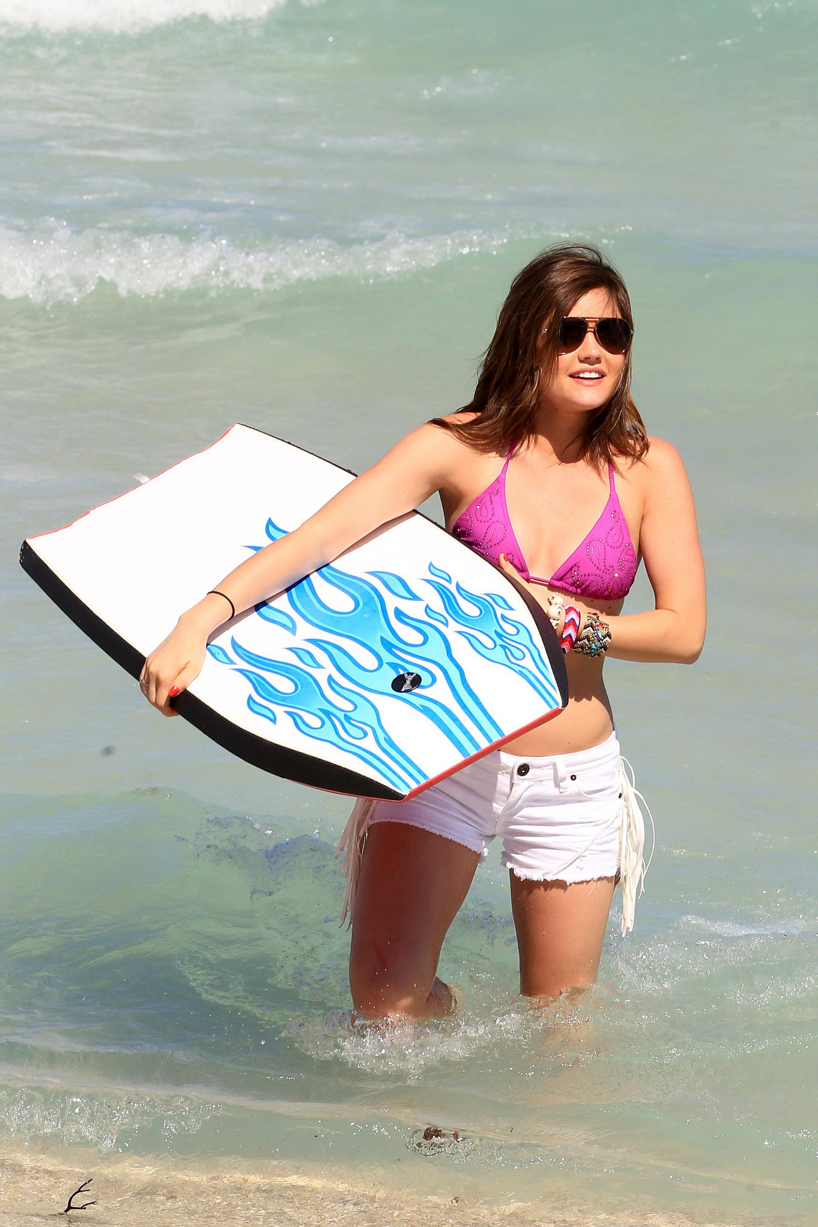 Lucy Hale and Ashley Benson photoshoot at the Bondo Bikini Shack on Miami Beach on March 24, 2012