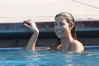 Katherine Webb, Miss Alabama USA 2012, in a pink swimsuit on the set for the TV show 'Celebrity Diving' in Los Angeles.