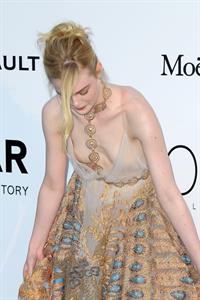 Elle Fanning showing off pasties at amfAR’s 23rd Cinema Against AIDS Gala