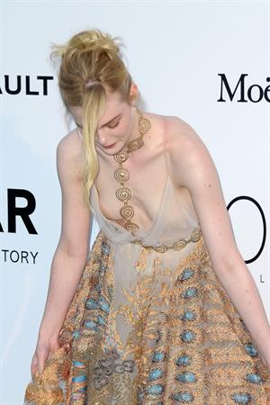 Elle Fanning showing off pasties at amfAR’s 23rd Cinema Against AIDS Gala