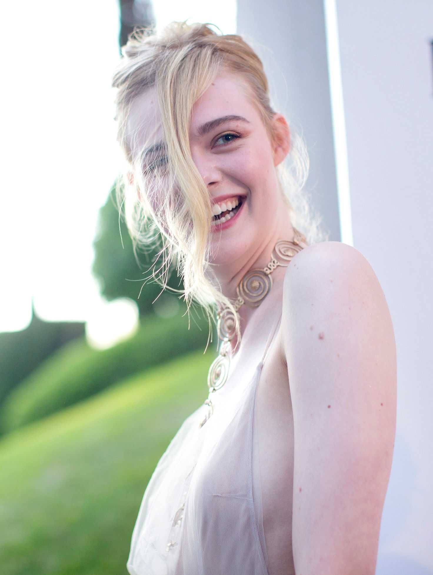 Elle Fanning showing off pasties at amfAR’s 23rd Cinema Against AIDS Gala