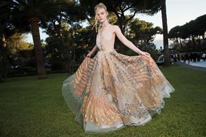 Elle Fanning showing off pasties at amfAR’s 23rd Cinema Against AIDS Gala