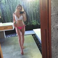 Anna Nyström in a bikini taking a selfie