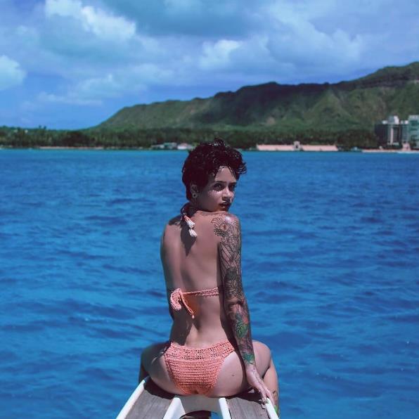 Kehlani in a bikini taking a selfie
