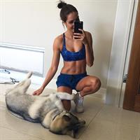 Kayla Itsines taking a selfie