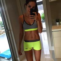 Kayla Itsines taking a selfie