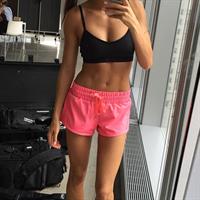 Kayla Itsines taking a selfie