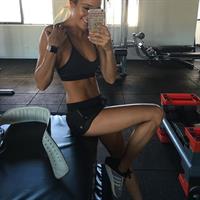 Kayla Itsines taking a selfie
