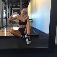 Kayla Itsines taking a selfie
