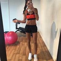 Kayla Itsines taking a selfie