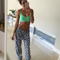 Kayla Itsines taking a selfie