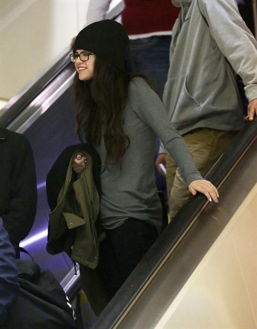 Selena Gomez arrives on a flight at Los Angeles Airport December 21, 2012 