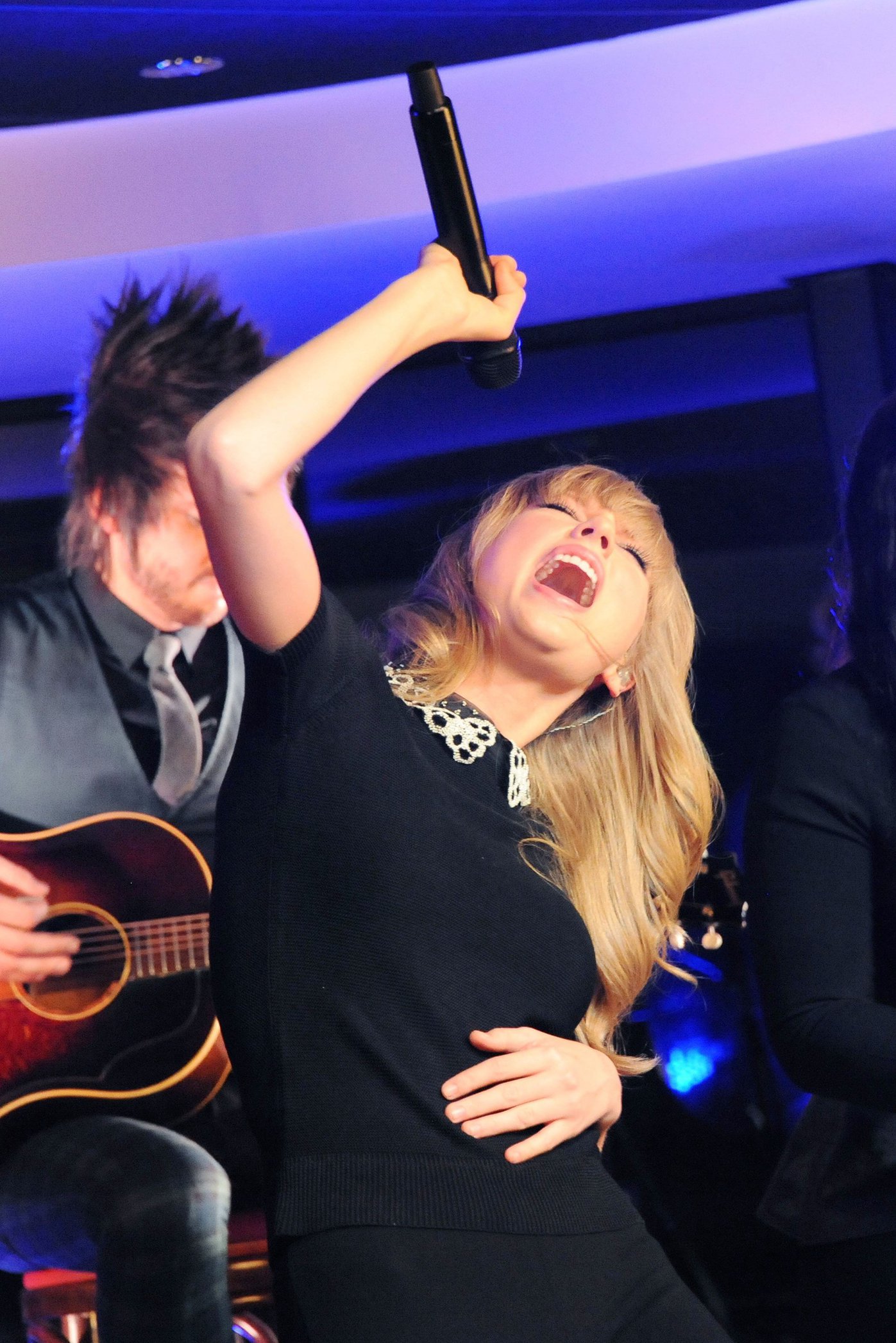 Taylor Swift performs at a private concert for NRJ on a barge on The Seine January 28, 2013 