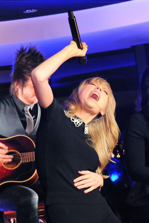 Taylor Swift performs at a private concert for NRJ on a barge on The Seine January 28, 2013 