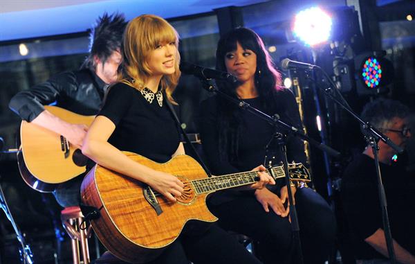 Taylor Swift performs at a private concert for NRJ on a barge on The Seine January 28, 2013 