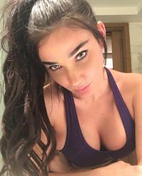 Kristina Basham in a bikini taking a selfie