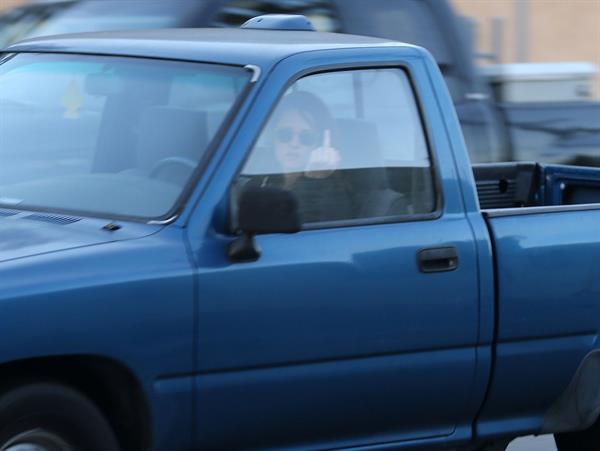 Kristen Stewart driving in Los Angeles - October 30, 2013  