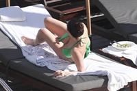 Kelly Brook bikini candids by the pool in Miami 2/1/13 