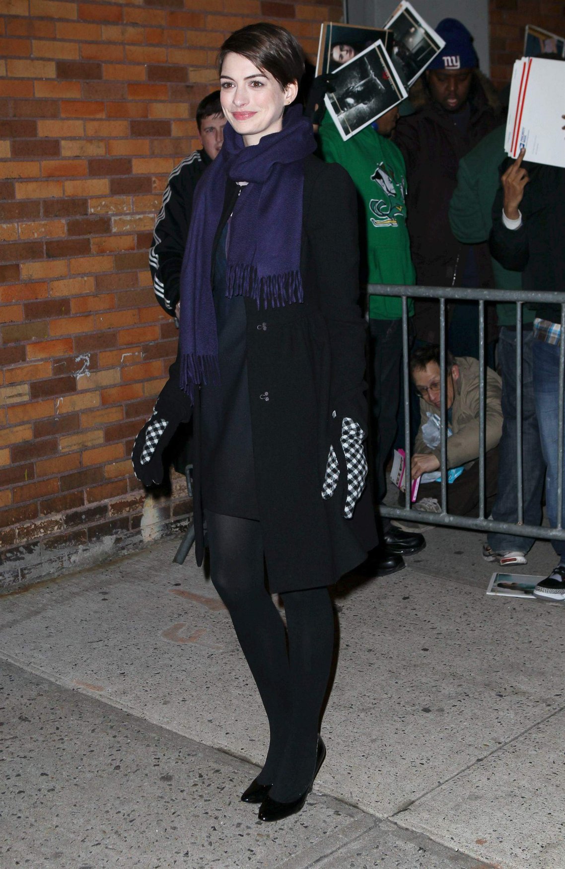 Anne Hathaway outside of The Daily Show with Jon Stewart in NYC. January 7-2013 