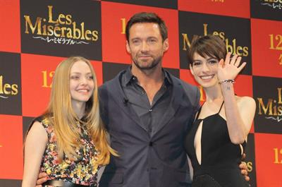 Anne Hathaway poses for photographers during an event to promote their latest movie 'Les Miserables' in Tokyo