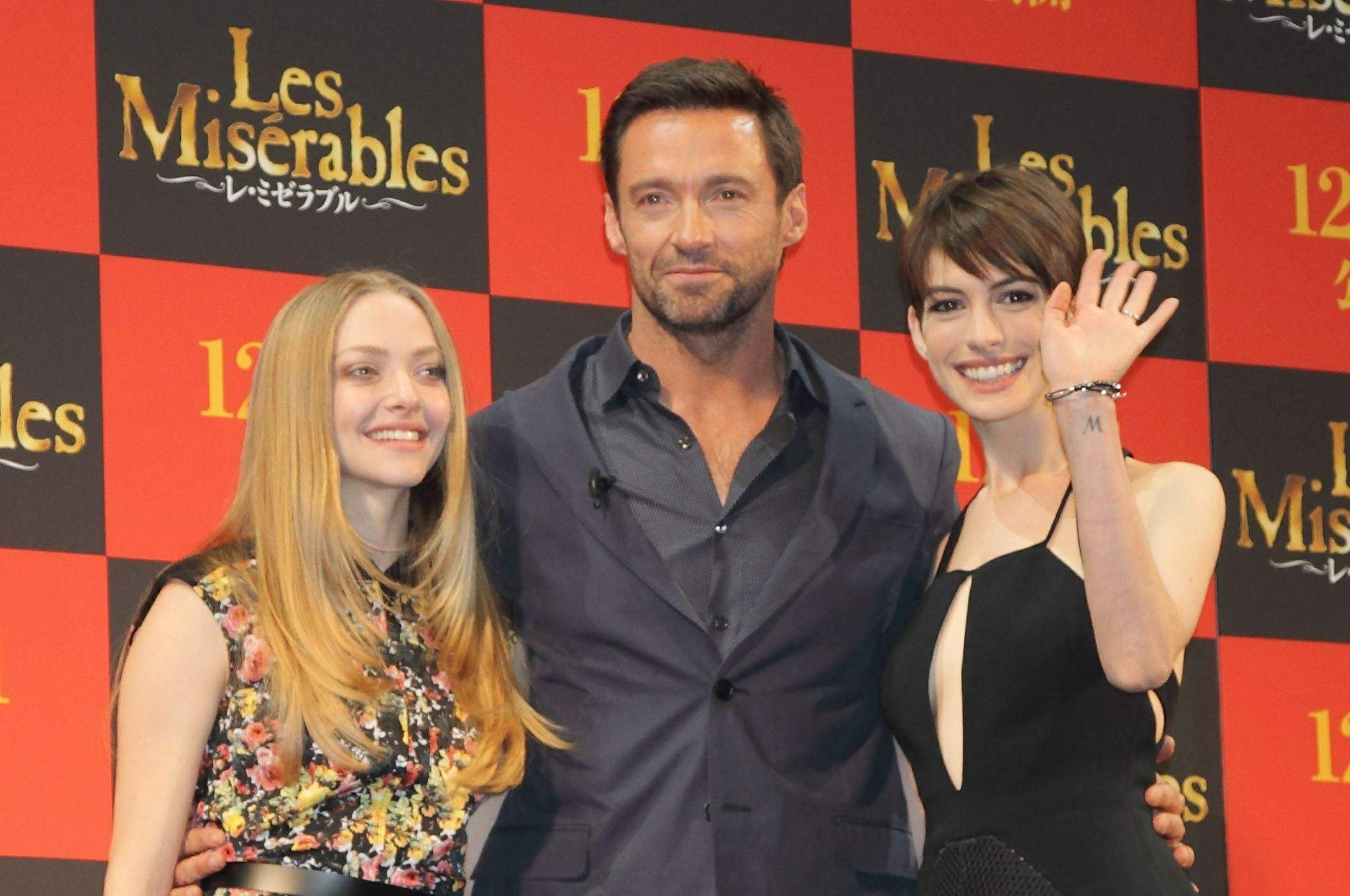 Anne Hathaway poses for photographers during an event to promote their latest movie 'Les Miserables' in Tokyo