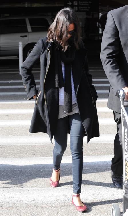 Zoe Saldana arriving into LA Airport - April 4, 2010  