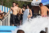 Katy Perry talks with a group of her friends after spending the afternoon at Raging Waters in San Dimas, California on August 12, 2012