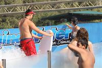 Katy Perry talks with a group of her friends after spending the afternoon at Raging Waters in San Dimas, California on August 12, 2012