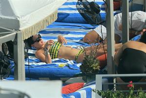 Katy Perry - In a bikini at a hotel pool in Miami July 27, 2012